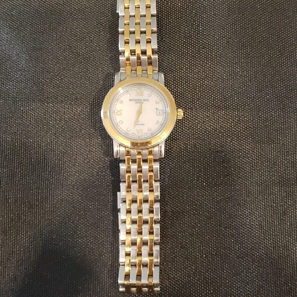 Raymond  Weil Toccata woman's watch with pearl face and Diamond accents.